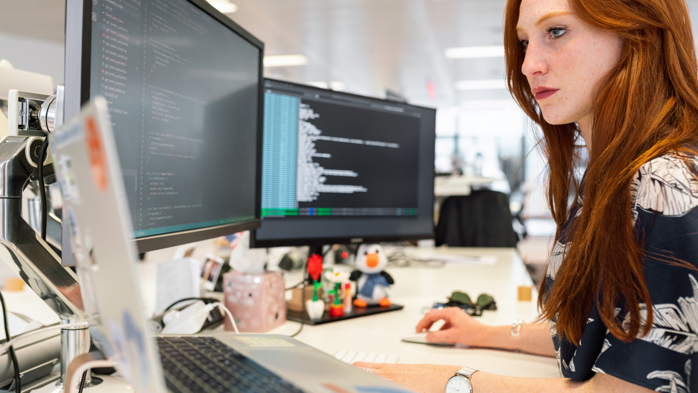 Woman coding on computer after a PC upgrade